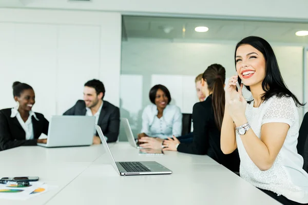 Businesswoman receiving good news on the phone — Stock Photo, Image