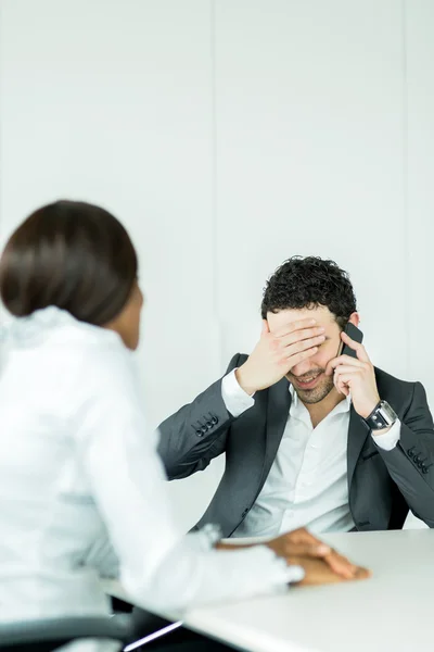 Businessman receiving bad news on the phone — Φωτογραφία Αρχείου