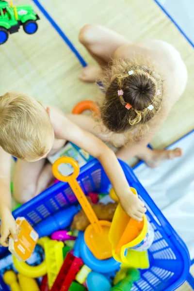 Children playing with plastic toys — Stock Image Children playing with plastic toys Stock Picture