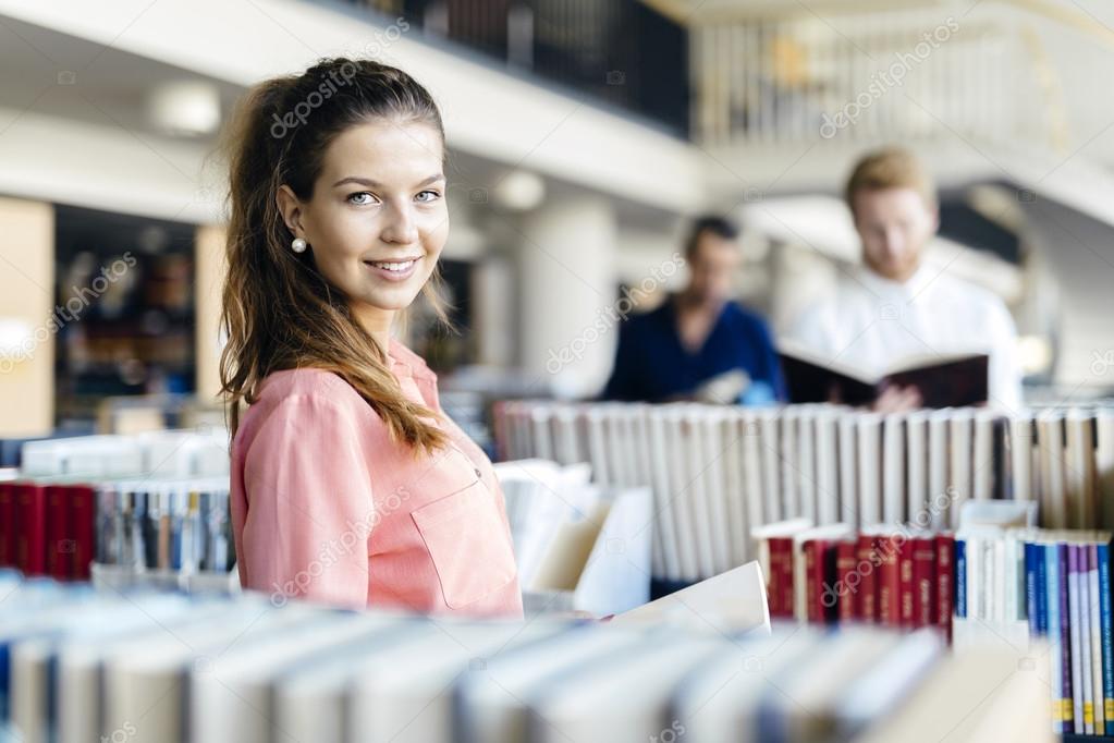 Beautiful student in library