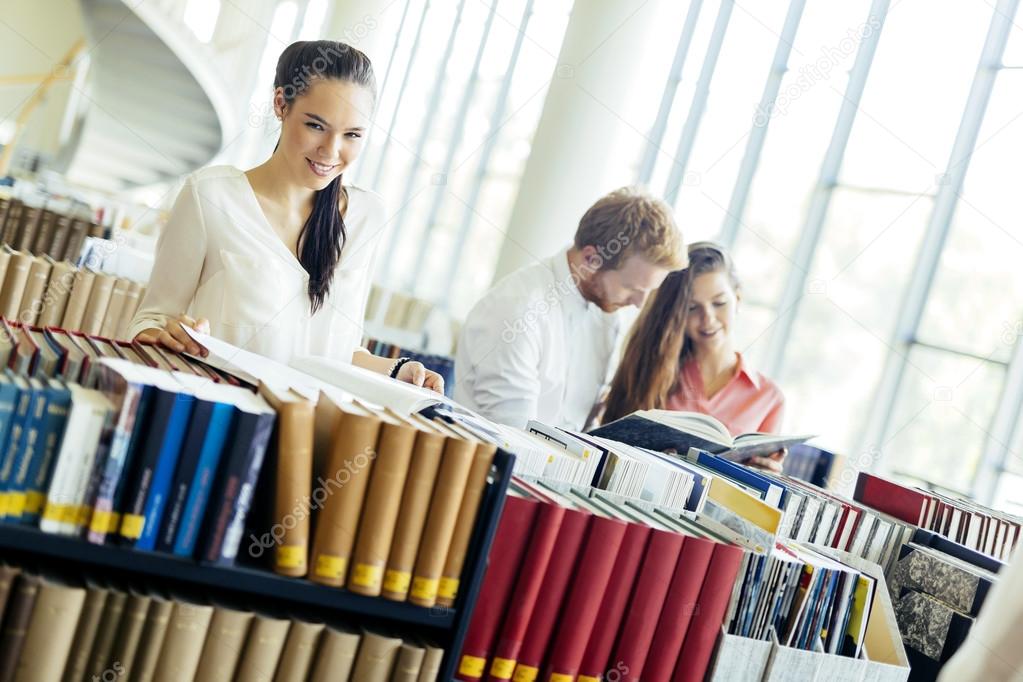 Group of students studying in library