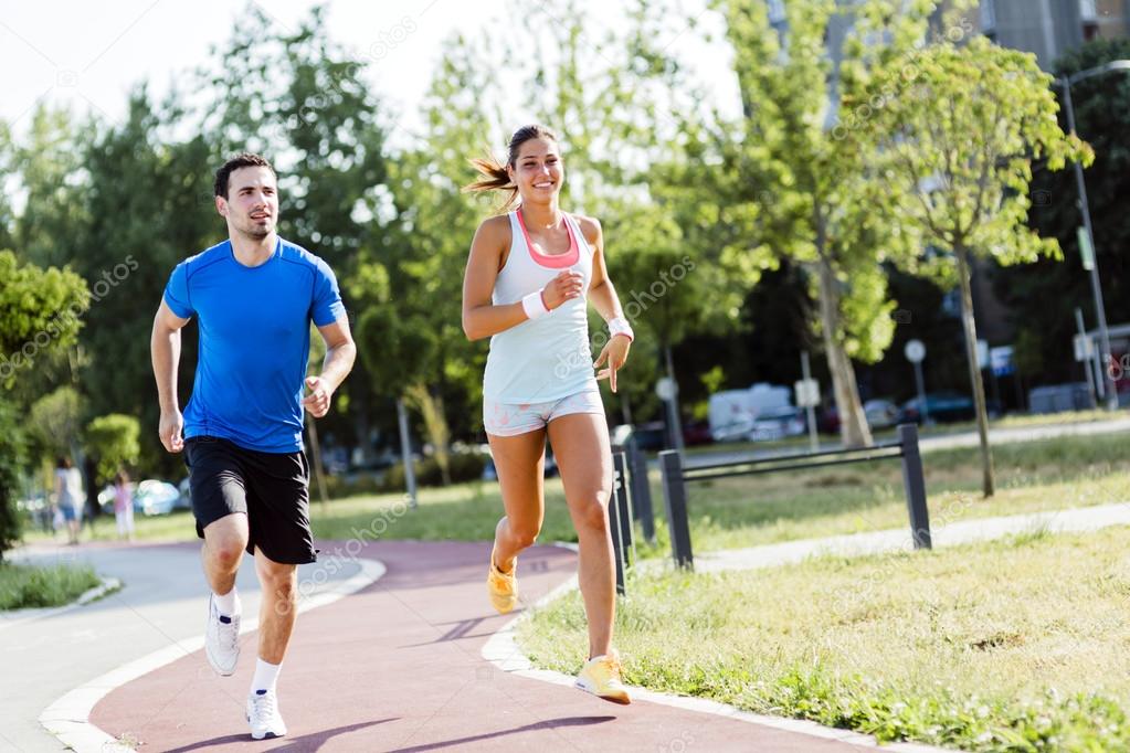 A man and a woman jogging