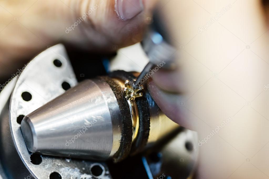 Ring being repaired by jeweler