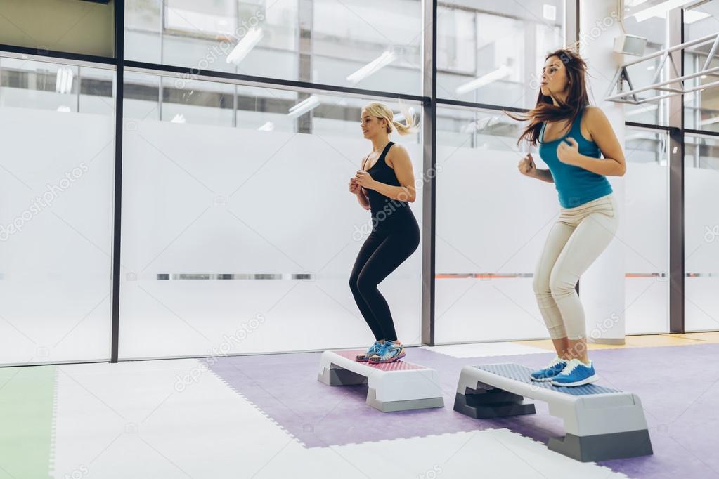 Beautiful women exercising aerobics