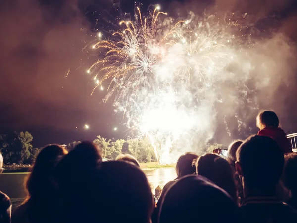 Crowd wathcing fireworks — Stock Photo, Image