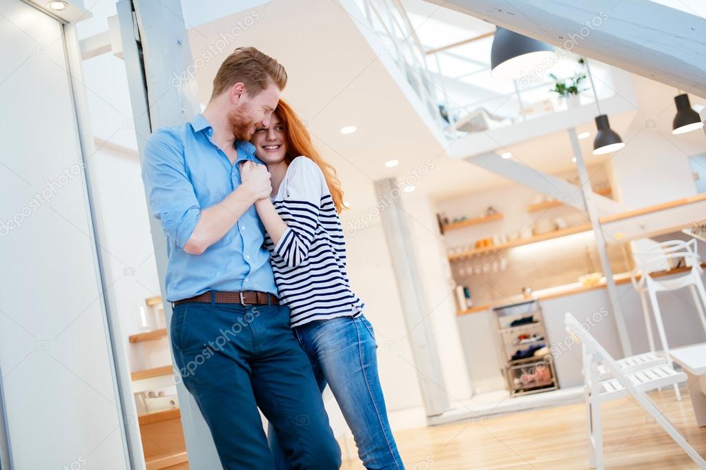 Beautiful couple in stylish home