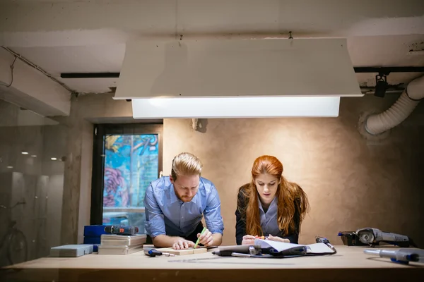 People working in modern beautiful workshop — Stock Photo, Image