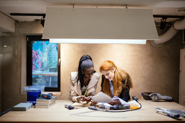 People working in modern workshop