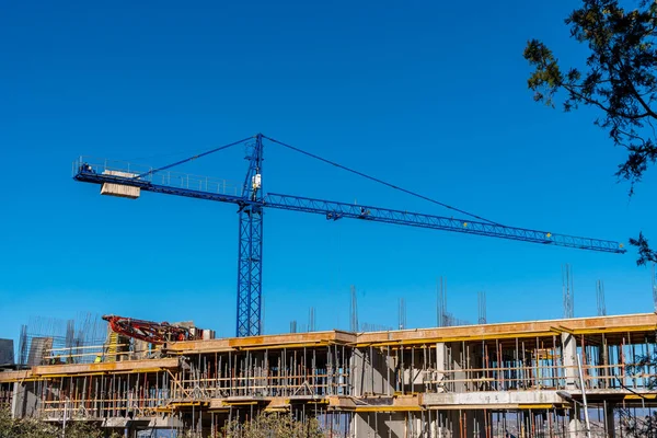 Building that is being built, concrete and sticking fittings. Architecture