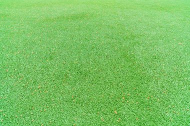Yeşil yapay çimenler doğal arka plan, stadyum avluda. Spor.