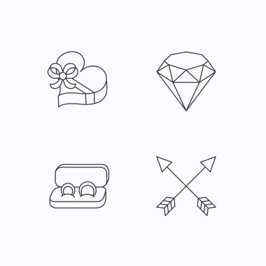 Parlak, hediye kutusu ve düğün yüzük simgeler.