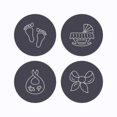 Ayak izi, beşik ve kirli önlüğü simgeler.