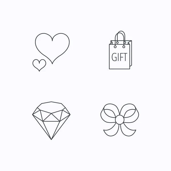 Corazón de amor, bolsa de regalo e iconos brillantes . — Archivo Imágenes Vectoriales