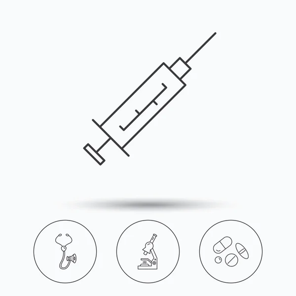 Syringe, stethoscope and microscope icons. — Stock Vector