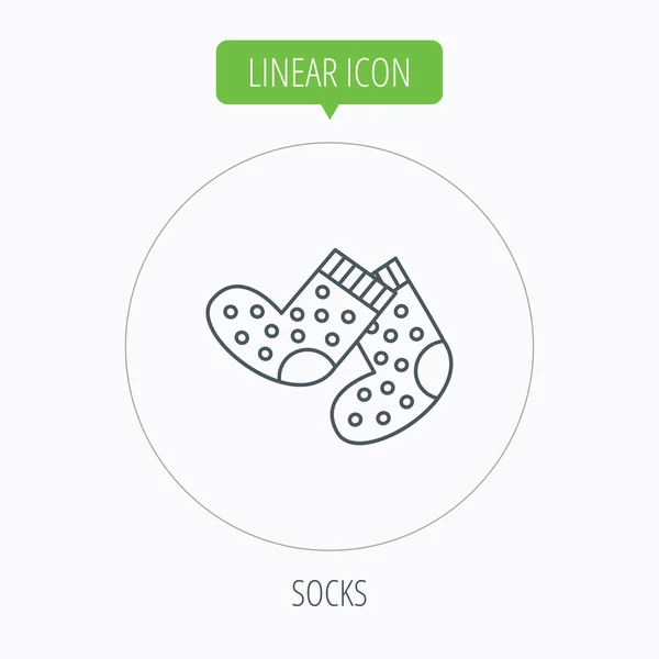 Ponožky ikona. Dětské spodní prádlo znamení. — Stockový vektor