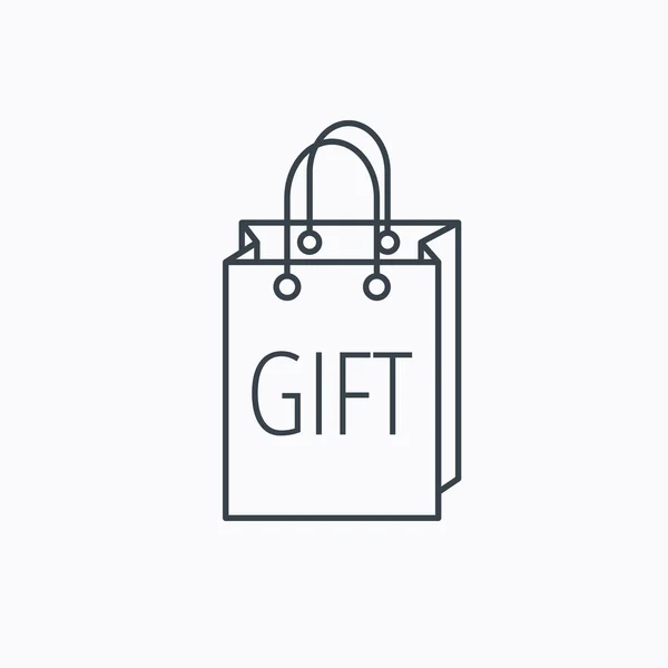Icono de bolsa de compra regalo. Presente el cartel del bolso . — Vector de stock