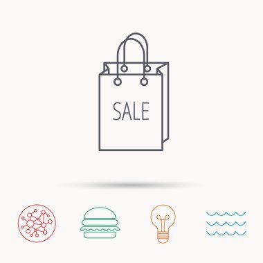 Satılık alışveriş çantası simgesi. El çantası işareti indirim.