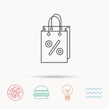 Alışveriş çantası simgesi. İndirimler ve satış işareti.