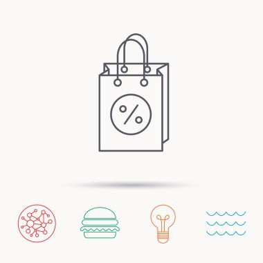 Alışveriş çantası simgesi. İndirimler ve satış işareti.