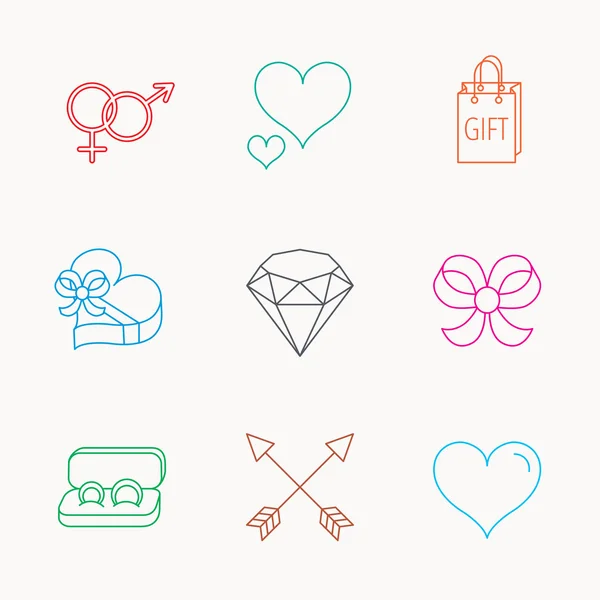 Coeur d'amour, boîte cadeau et alliances icônes . — Image vectorielle