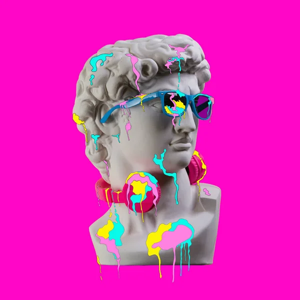 Statue. Earphone on a pink background. Gypsum statue of David\'s head. Creative. Plaster statue of David\'s head in blue sunglasses. Minimal concept art.