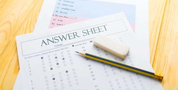 Pencil on answer sheet and question sheet — Stock Photo, Image