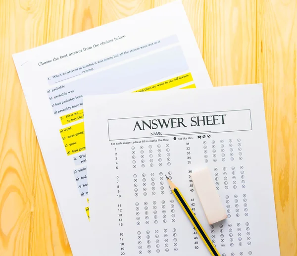 Pencil on answer sheet and question sheet — Stock Photo, Image