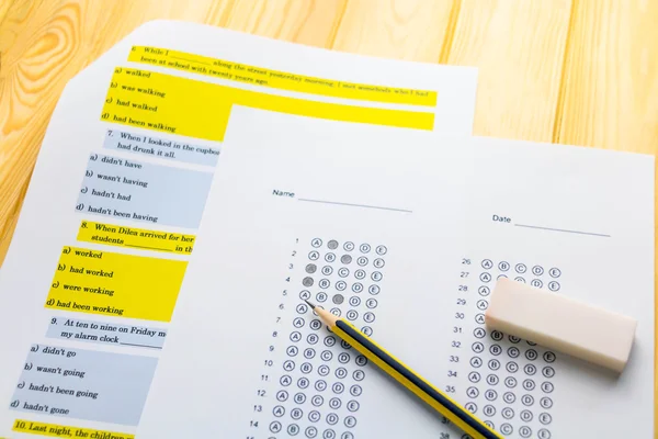 Pencil on answer sheet and question sheet — Stock Photo, Image