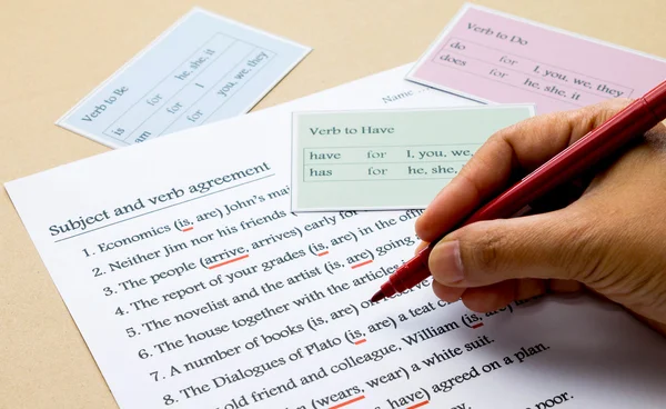 English grammar exercise on table — Stock Photo, Image