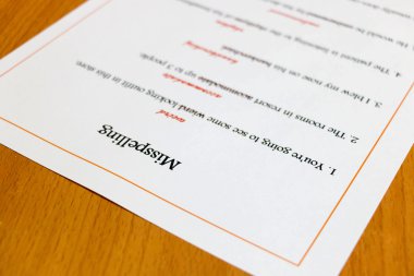 misspelling sheet on table clipart