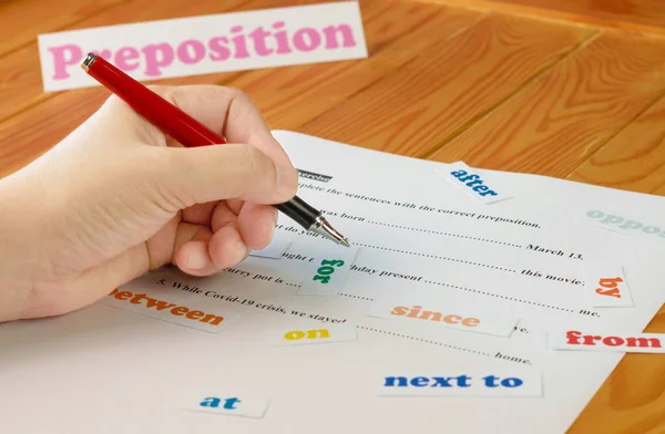 English Preposition Work Sheet Wooden Table Colorful Russian Word Cards — стоковое фото