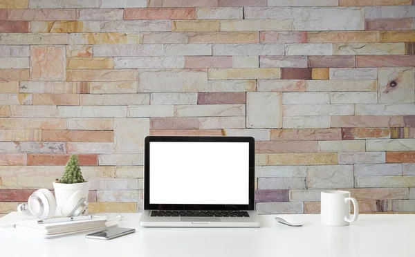 Modern workspace with computer with blank screen and equipment on white table.Blank screen for your information