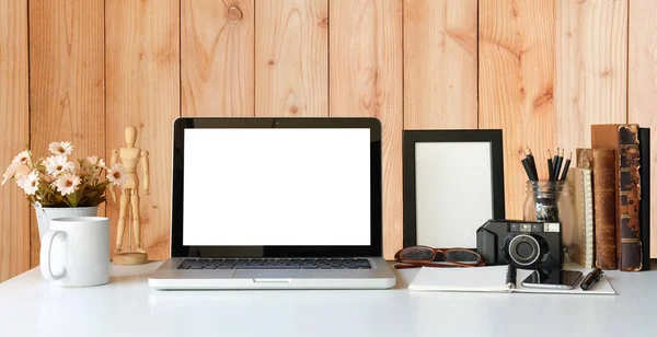 Modern workspace with computer with blank screen and equipment on white table.Blank screen for your information