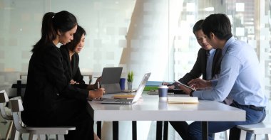 Business team are working together at meeting room at modern office.	