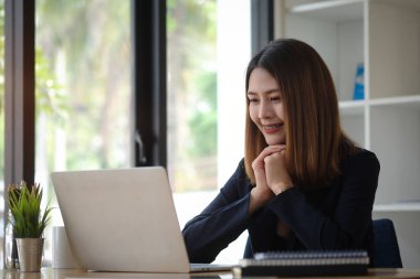 Business people in the office are planning a strategy for the future of the business.	