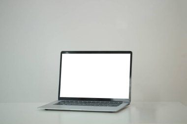 Workspace desk and laptop. copy space and blank screen. Business image, Blank screen laptop and supplies.	