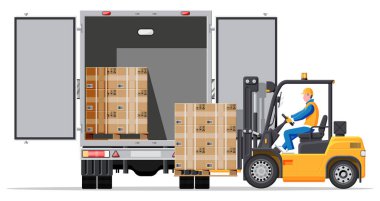 Forklift palet kutularını kamyonete yüklüyor.