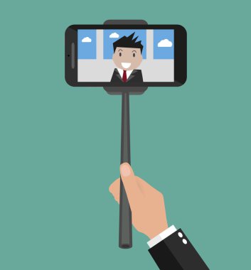 Taking a self portrait with monopod