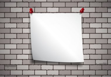 Arka plan ile bir not kağıdına bir tuğla duvar