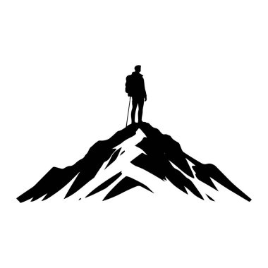 Gün doğumunda dağın zirvesinde duran bir dağcının silueti.