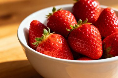 Fresh Strawberries In White Bowl Close Up