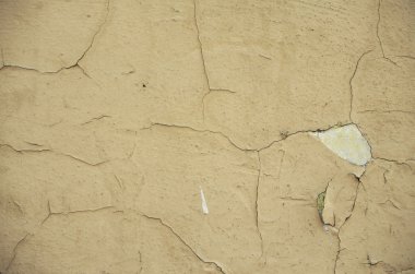 Kırık sıva ile eski parlak duvar.