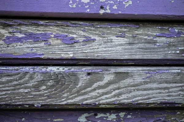 Доски со старой потрескавшейся краской . — стоковое фото
