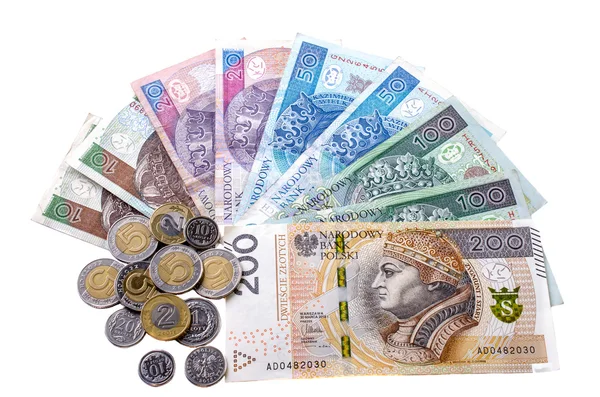 Zloty polonês e moedas em um fundo branco . — Fotografia de Stock