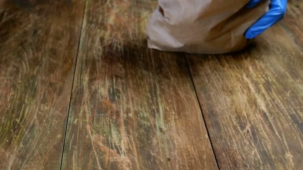 Cooks job. Different citrus fruit put in row from paper bag onto wooden table. Tangerine and lemon. Close-up. — Stock Video