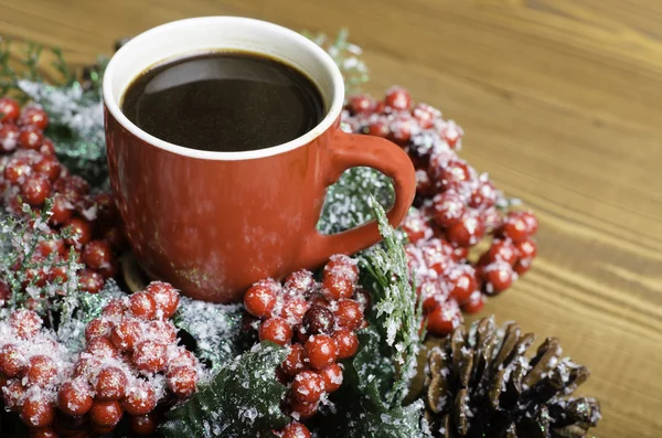 Christmas wreath and cup of coffee.