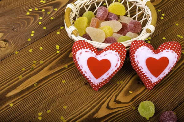 Red hearts and marmalade. — Stock Photo, Image