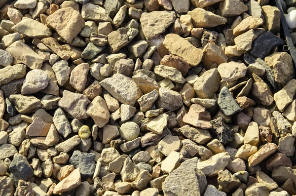 Textur färgade små och stora stenar. — Stockfoto
