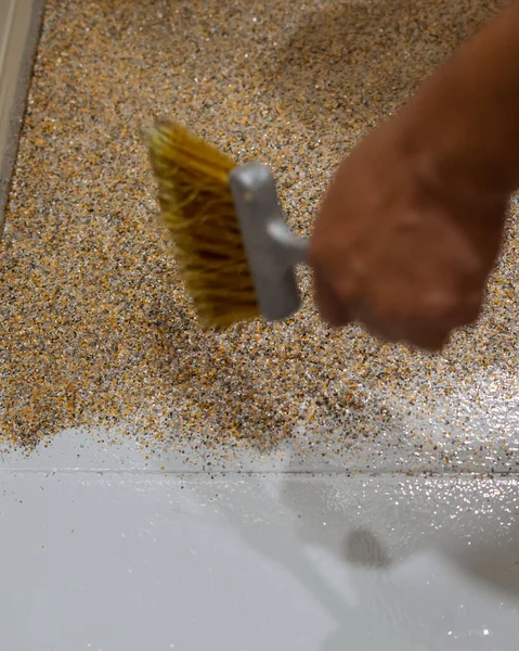 Color flake flooring textured background .Close up.Color Flakes make resinous flooring as beautiful as it is practical.Concrete floor,sprinkle with flake stone and smooth.