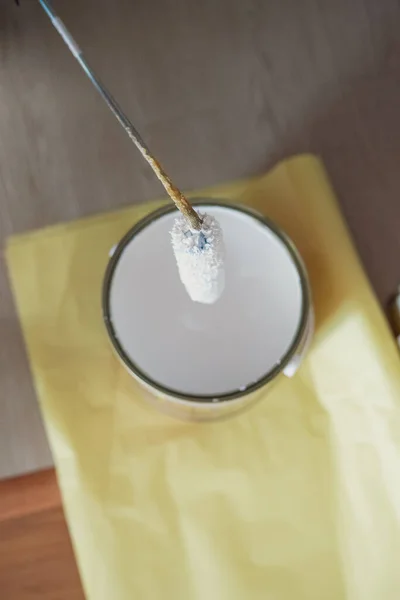 stock image White paint in a container. Painting wall project.